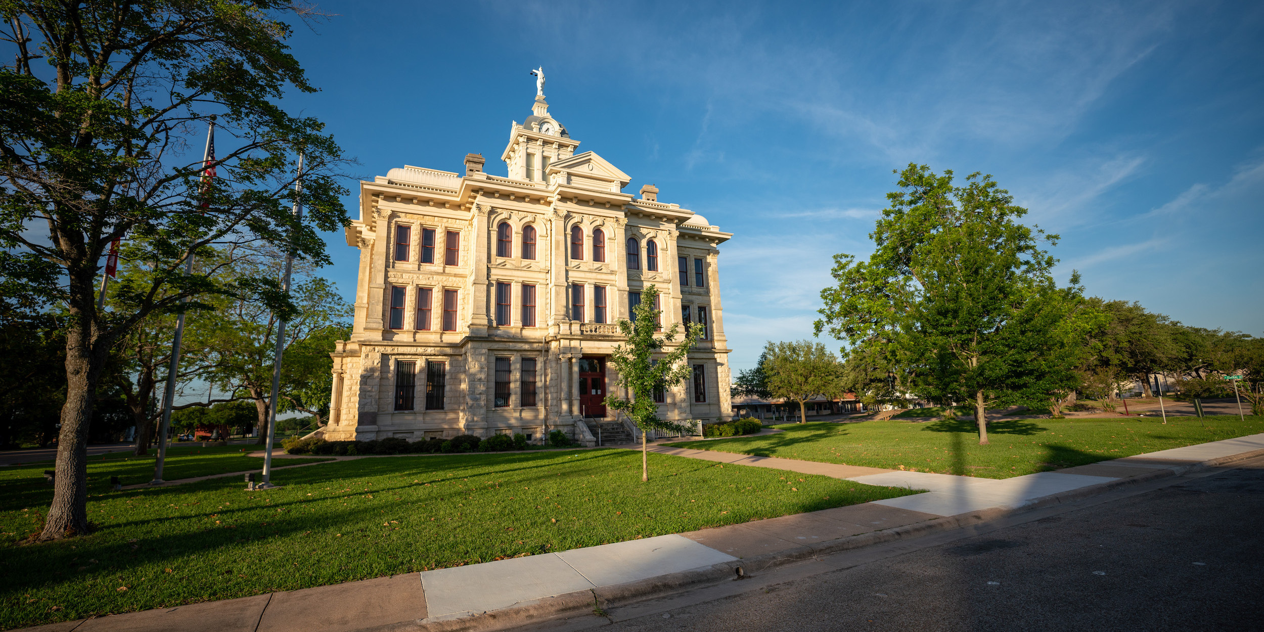 Street view of the courthouse with the sun setting